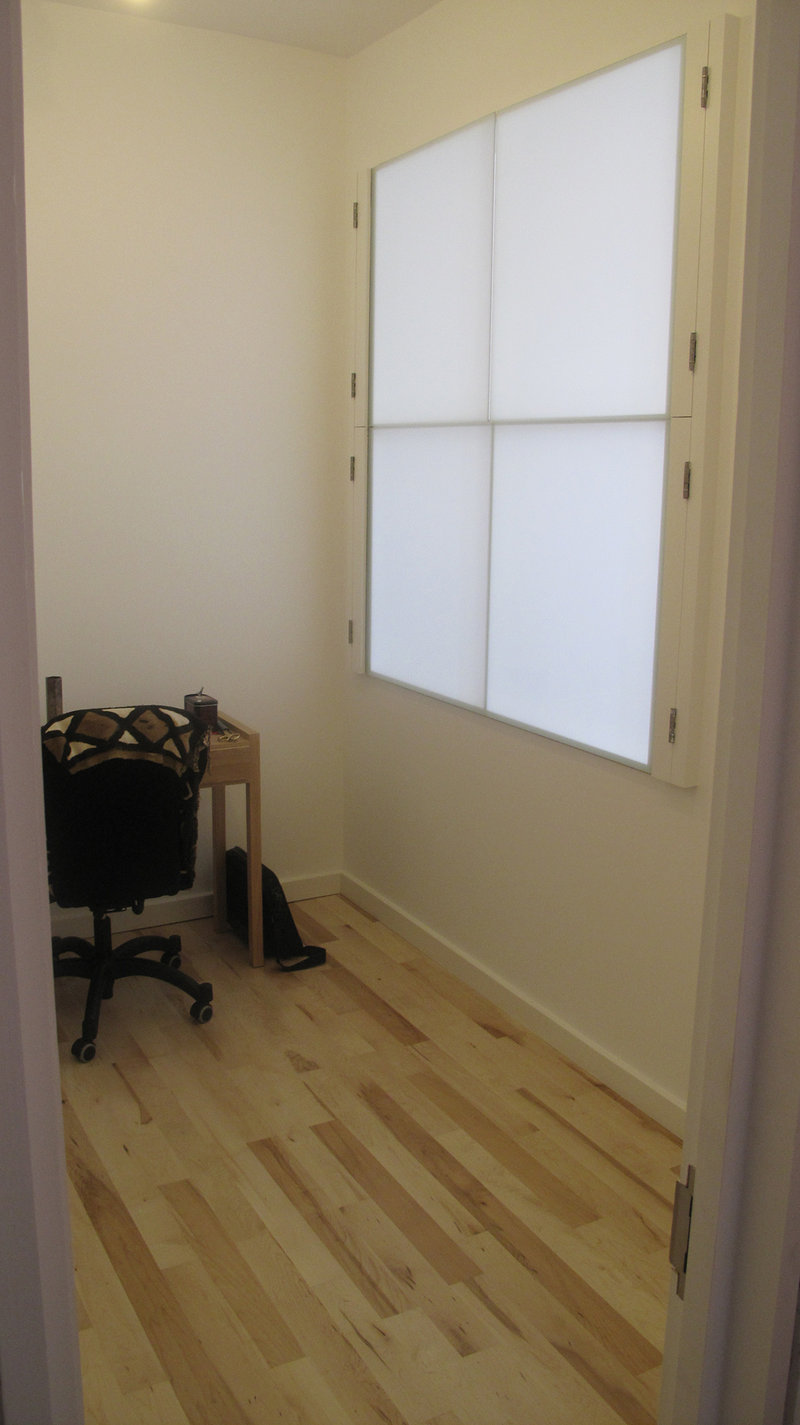 Home office remodeled. Studded, dry lined & plastered. New maple strip flooring, new wall opening with 4 frameless individually hinged & frosted glass panels. Hampstead NW3, London 